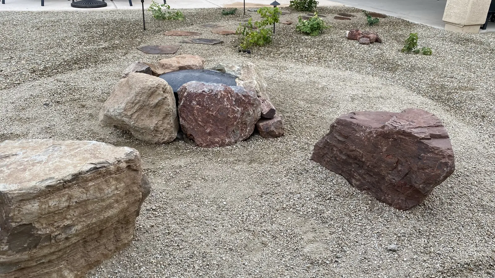 Wood burning fire pit boulders
