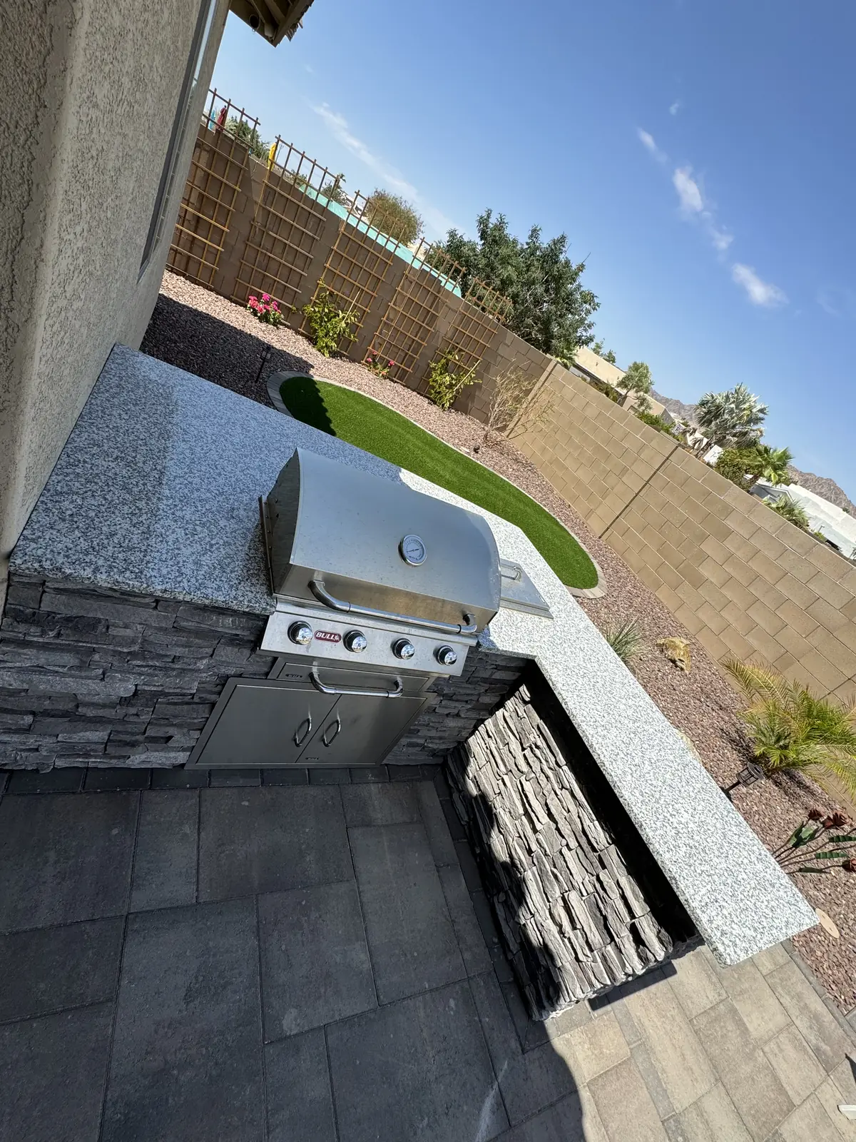 Outdoor kitchen granite countertop grill