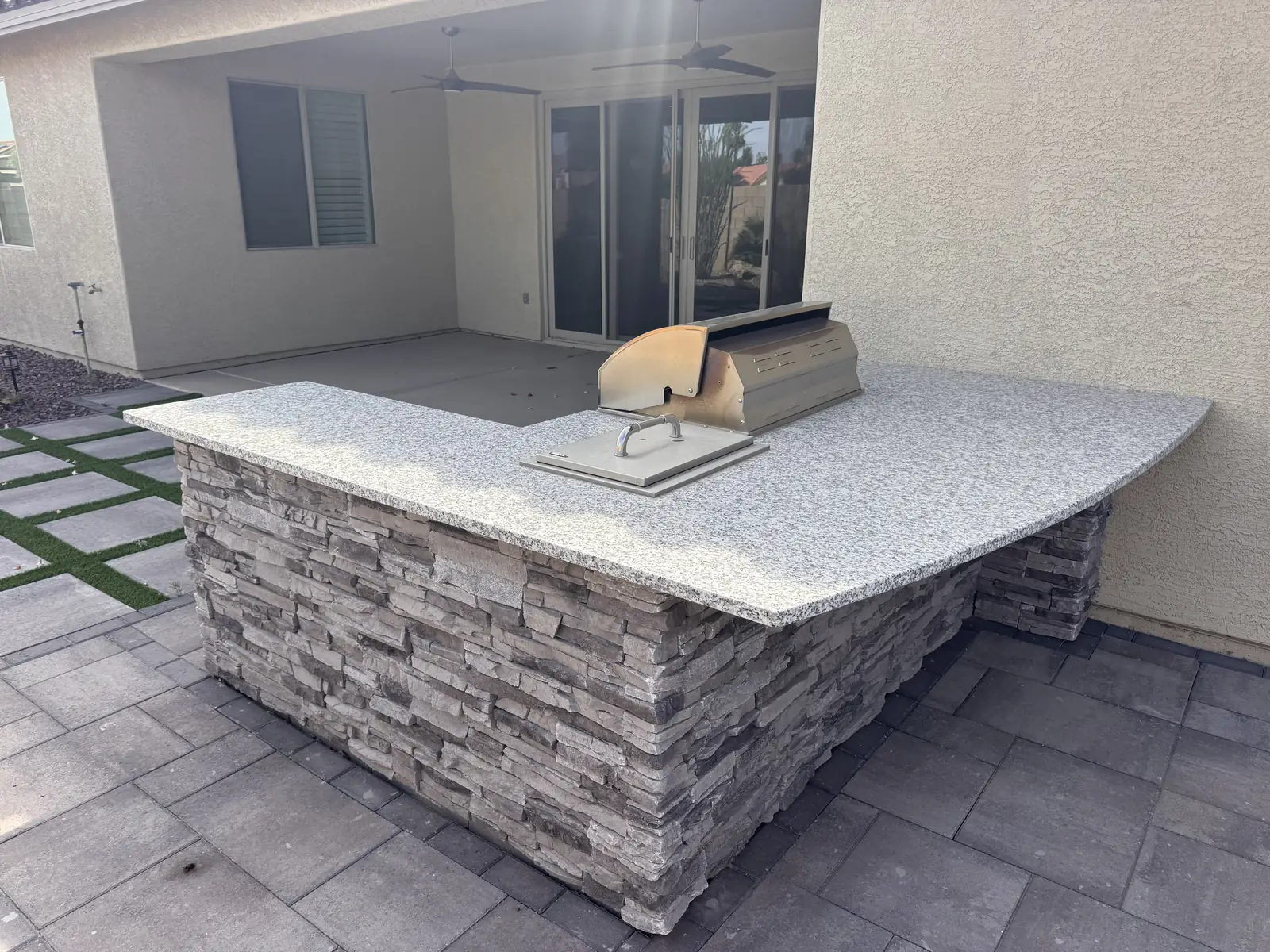 Outdoor kitchen island covered patio