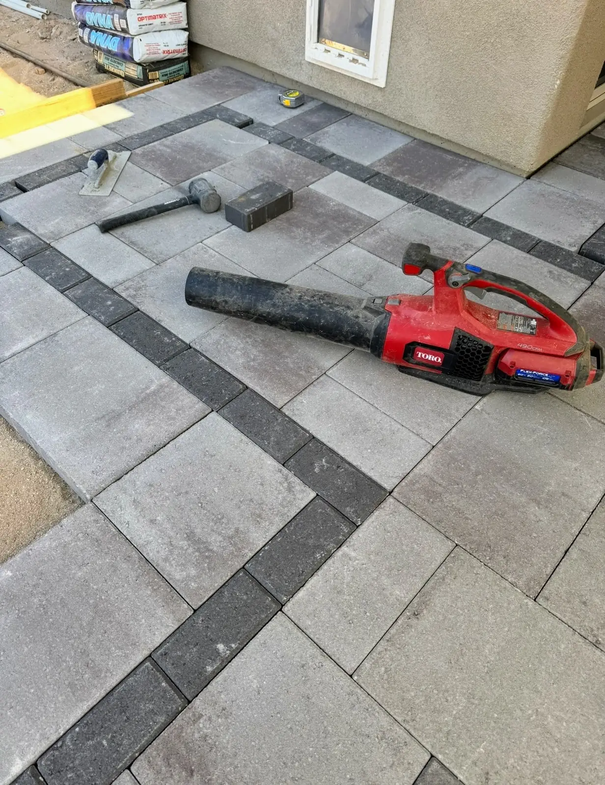 Large format paver install accent banding