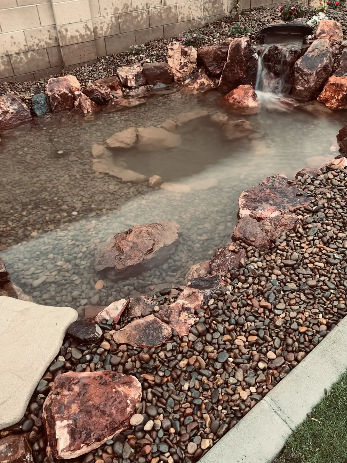 Natural pond boulders gravel