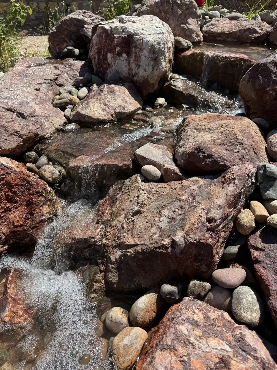 Stream cascade with natural stone